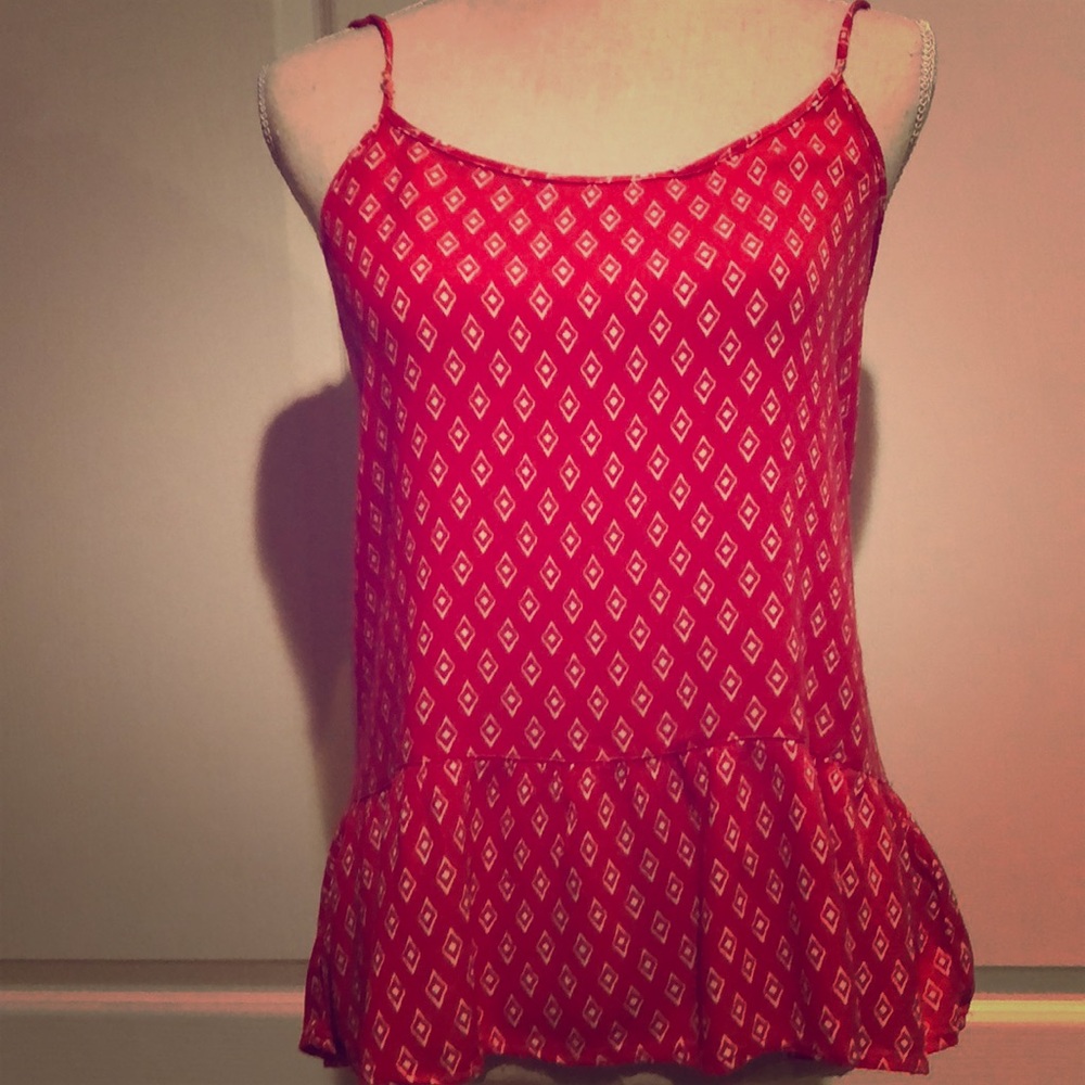 Light, bright colored summer blouse.